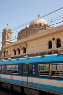 Cairo Metro / Metro train passing the Church of St. George, Old Cairo
