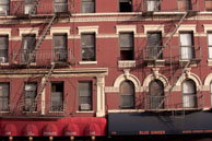 New York fire escapes / View of fire escapes above two New York restaurants