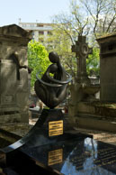 Artistic Grave / Modern statue on a grave in Montmartre Cemetery