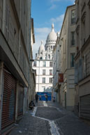 Looking up to Sacre-Coeur Basilica / View from a side street in Montmartre to Sacre-Coeur Basilica