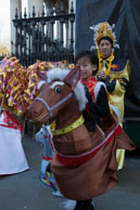 Young girl dressed as a horse / A young Chinese girl dressed as a horse before the parade to celebrate the Year of the Horse