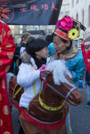 Horse and Young Girl / Young Chinese girl dressed as a horse in the parade to celebrate the Chinese Year of the Horse