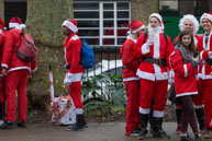 London Santacon 2015 - #124 / Hundreds of Santas take to the London streets to spread Christmas cheer
