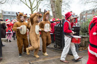 London Santacon 2015 - #219 / Hundreds of Santas take to the London streets to spread Christmas cheer