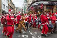 London Santacon 2015 - #283 / Hundreds of Santas take to the London streets to spread Christmas cheer