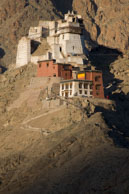 Perched on the mountain side / Group of buildings perched on the side of a mountain