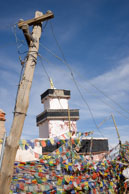Thiksey Gompa / Prayer flags on top of Thiksey Gompa
