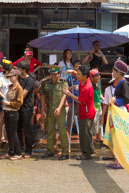 Dousing policeman / Religious procession for Lao New Year in Luang Prabang and following celebrations