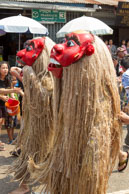 Two masked lions / Religious procession for Lao New Year in Luang Prabang and following celebrations