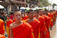 Row of monks / Religious procession for Lao New Year in Luang Prabang and following celebrations