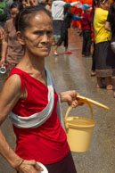 Waiting with water / Religious procession for Lao New Year in Luang Prabang and following celebrations