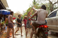 Stopped and Soaked / Religious procession for Lao New Year in Luang Prabang and following celebrations
