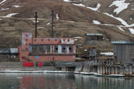 Abandoned building at the Pyramiden dock / Pyramiden, an abandoned Russian mining settlement