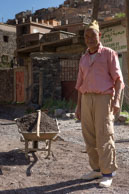 Man and barrow / Environmental portrait of a man with this wheelbarrow and tools in the hill-top village of Armed,  Morocco