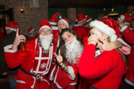 Santas (2014-222) / London Santas were raising money for the St Christopher's Hospice in South London and having a few drinks around Pimlico.