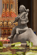 Meditatiom / A mediatating statue outside a temple