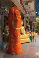 Budha rapped to go / In the Budha shop area of Bangkok