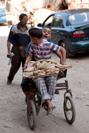 Boys & bread / Boys transporting bread in the suburbs of Cairo