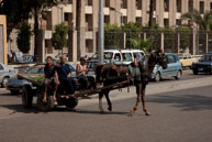 Turning horse & cart / Horse and cart turning on a busy road in Cairo