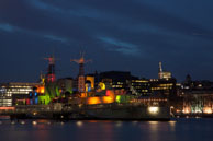 HMS Belfast in Colour lights / Night time view of HMS Belfast moored between London Bridge and Toweer Bridge