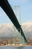 Under Lion's Gate bridge / From underneath Lion's Gate Bridge with mountains on th north shore