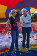 Chatting / Two balloonists chatting amongst laid out balloon canopies