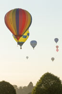 Mass Ascent in the morning / Many balloons flying towards Bristol in the morning sunlight