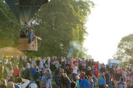 Balloonist or Gunman? / Balloonist fires water gun at the spectators  whilst flying low over them at Ashton Court, Bristol