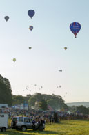 Multiple Balloons / Lots of balloons flying towards to Bristol from Ashton Court in the morning sunlight