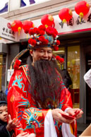God of Wealth (iI) / Chinese God of Wealth handing out good luck cards