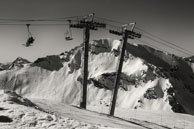 Chair lift / Near the top of the chair lift with mountains in the background