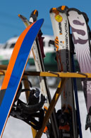 Skis in rack (1 in Colour) / Tips of the skis in a ski rack outside a mountain restuarant (in colour)