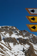 Arrows against the mountain / Series of arrowed signs against the mountain background