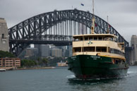 Ferry near Sydney Harbour Bridge / One of the Sydney ferries passing the Sydney Harbour Bridge