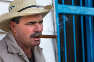 Tobacco Farmer / Enjoying one of his Cuban cigars on his tobacco farm