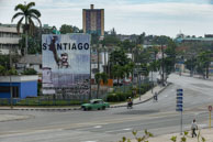 The Revolution in Santiago / Just on the edge of Antonio Maceo Revolution Square in Santiago de Cuba is this billboard