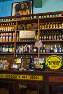 Mojitos in La Bodeguita del Medio / The bar of La Bodeguita del Medio with Ernest Hemmingway's sign which declare that he drank his mojitos here