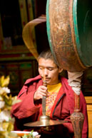 Chanting monk / Chanting monk banging his drum