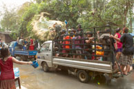 All caged in? / Religious procession for Lao New Year in Luang Prabang and following celebrations