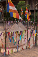 Flags & Sand Mounds / Temples, their surrounding and people in Seim Reap, Cambodia