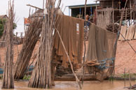 Hanging fishing nets / Experiences when travelling through villages in Cambodia