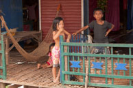 Young girl & boy / Experiences when travelling through villages in Cambodia