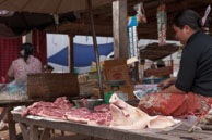 Pig's head at market / Experiences when travelling through villages in Cambodia