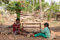 Locals sawing wood / Experiences when travelling through villages in Cambodia