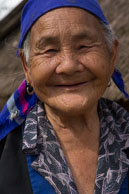 Lao Woman / Portrait of an older Lao woman in a small village on the road from Vang Vieng to Laung Prabang
