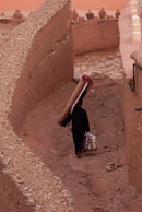 Man carrying a carpet / Man carrying a carpet in Ait Benhaddou