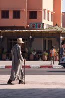 Old man in Marrakech / Old man walking along the street in Marrakech