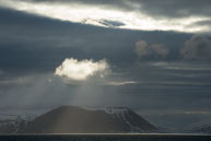 Lighting the Cloud / Sunlight above a cloud lights it whilst cruising along the Barents Sea, Svaland